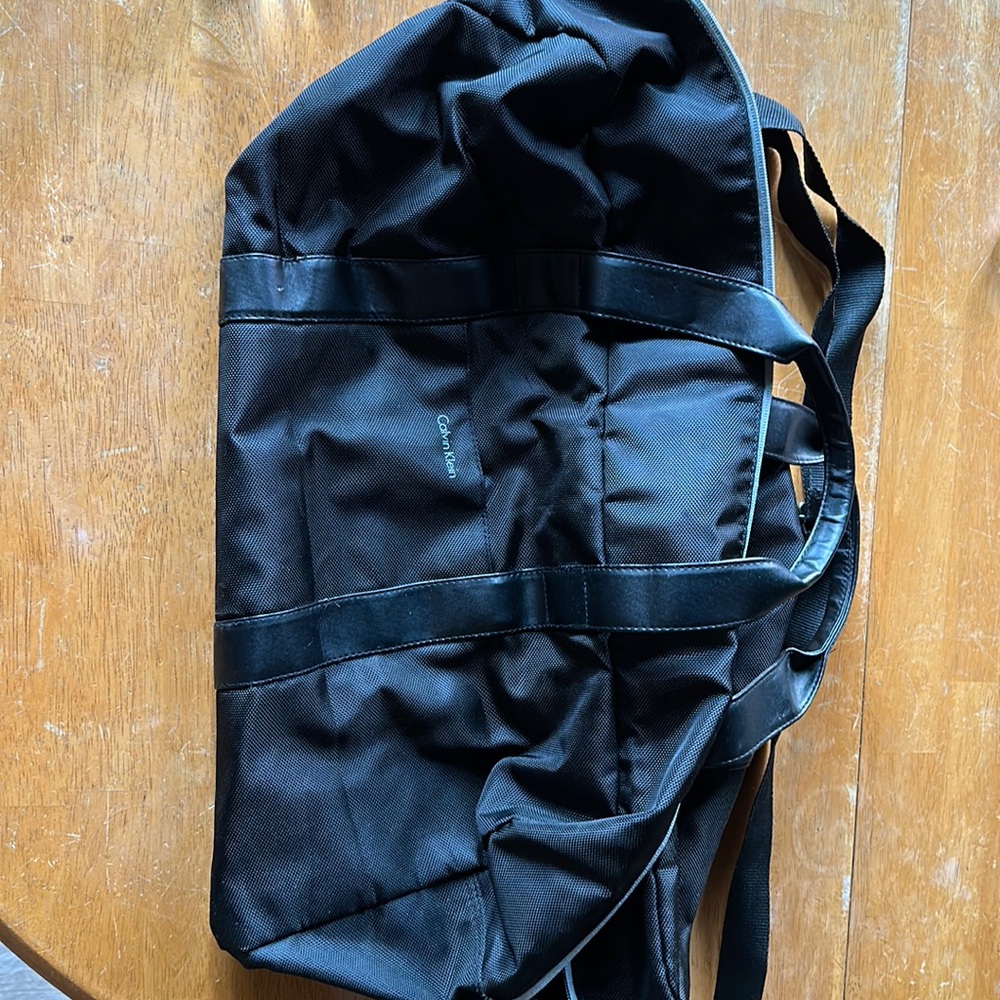 Calvin Klein duffel bag, slightly used, zipper is broken but may be fixable.